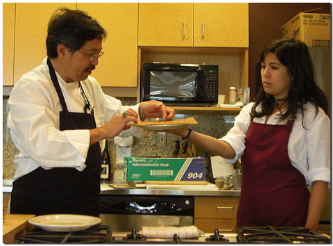 Robert Fong and daughter demonstrate Futomaki sushi rolling
